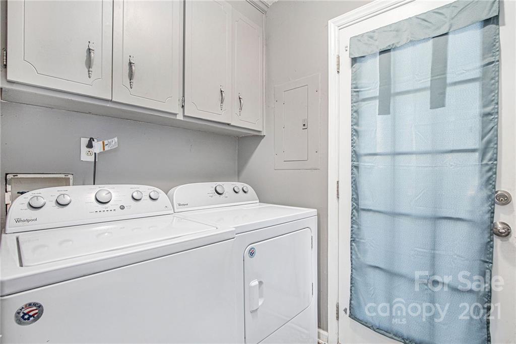 10227 Grand Junction Road Mint Hill, NC 28227 - Photo 25 of 27 a utility room with dryer and washer