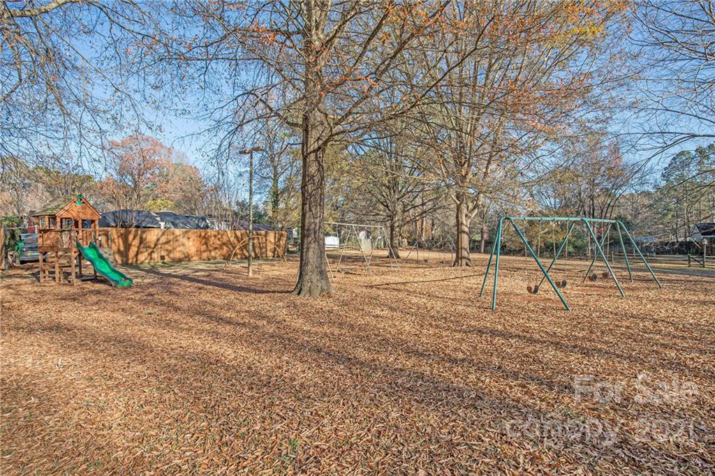 10227 Grand Junction Road Mint Hill, NC 28227 - Photo 27 of 27 a view of yard with tree
