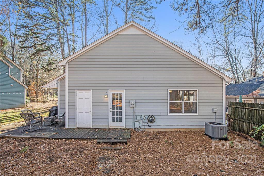 10227 Grand Junction Road Mint Hill, NC 28227 - Photo 5 of 27 a view of a house with a yard
