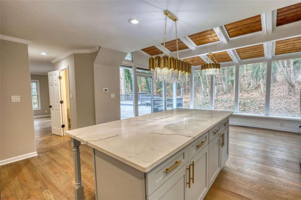 4205 Aberdeen Pass Roswell, GA 30075 - Photo 12 of 53 a kitchen with a stove and a wooden floors