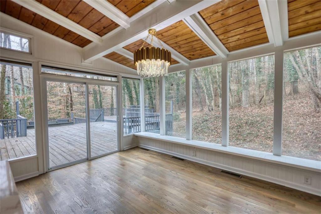 4205 Aberdeen Pass Roswell, GA 30075 - Photo 14 of 53 a view of empty room with wooden floor and fan