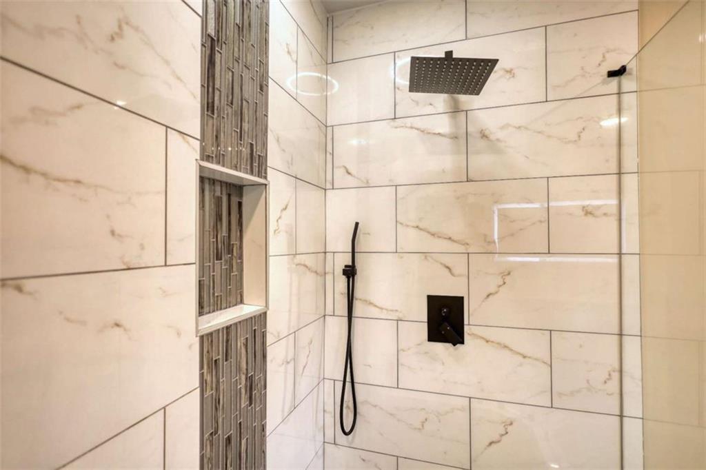 4205 Aberdeen Pass Roswell, GA 30075 - Photo 23 of 53 a bathroom with a shower