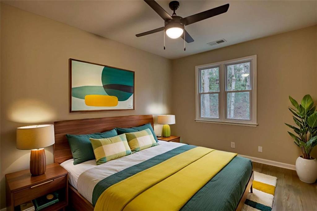 4205 Aberdeen Pass Roswell, GA 30075 - Photo 25 of 53 a bedroom with a bed and a window