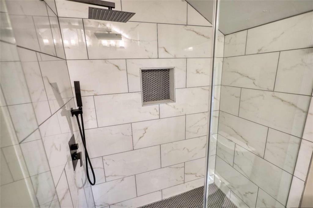 4205 Aberdeen Pass Roswell, GA 30075 - Photo 27 of 53 a bathroom with a shower