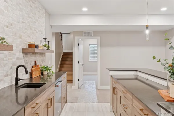a living room with furniture and a table