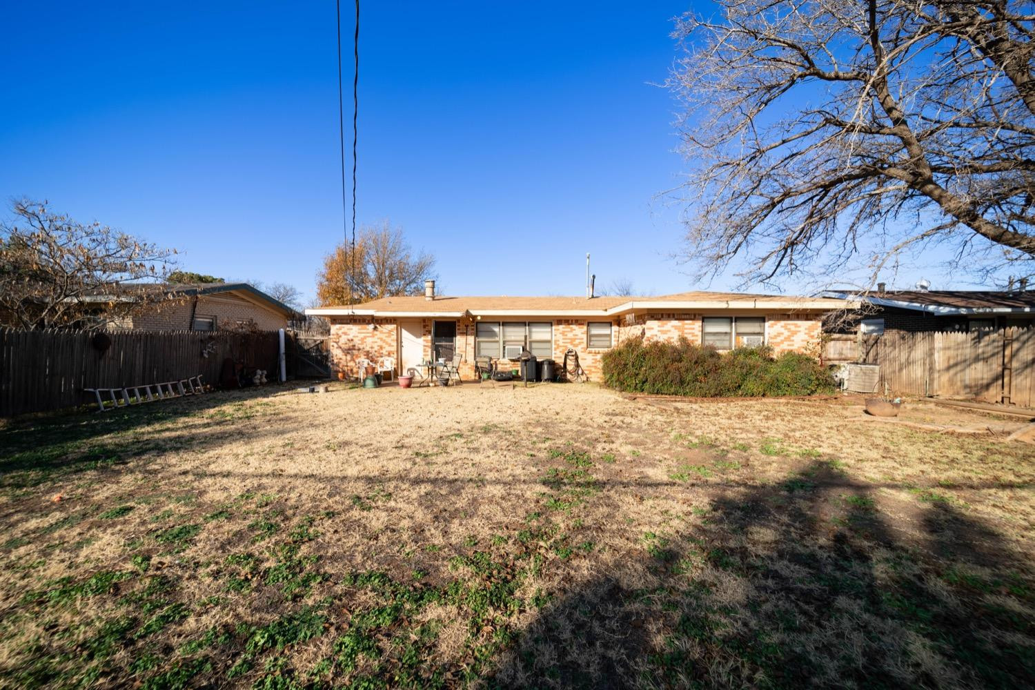 4811 43rd Street Lubbock, TX 79414 - Photo 19 of 20 a view of a house with a yard