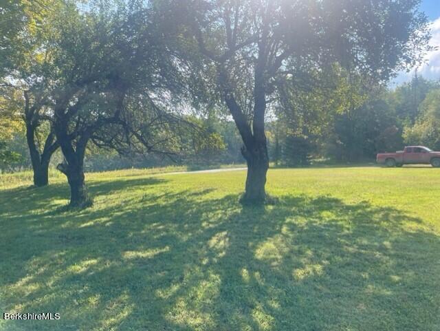 565 New State Road Savoy, MA 01256 - Photo 15 of 24 a view of an outdoor space with a lake view