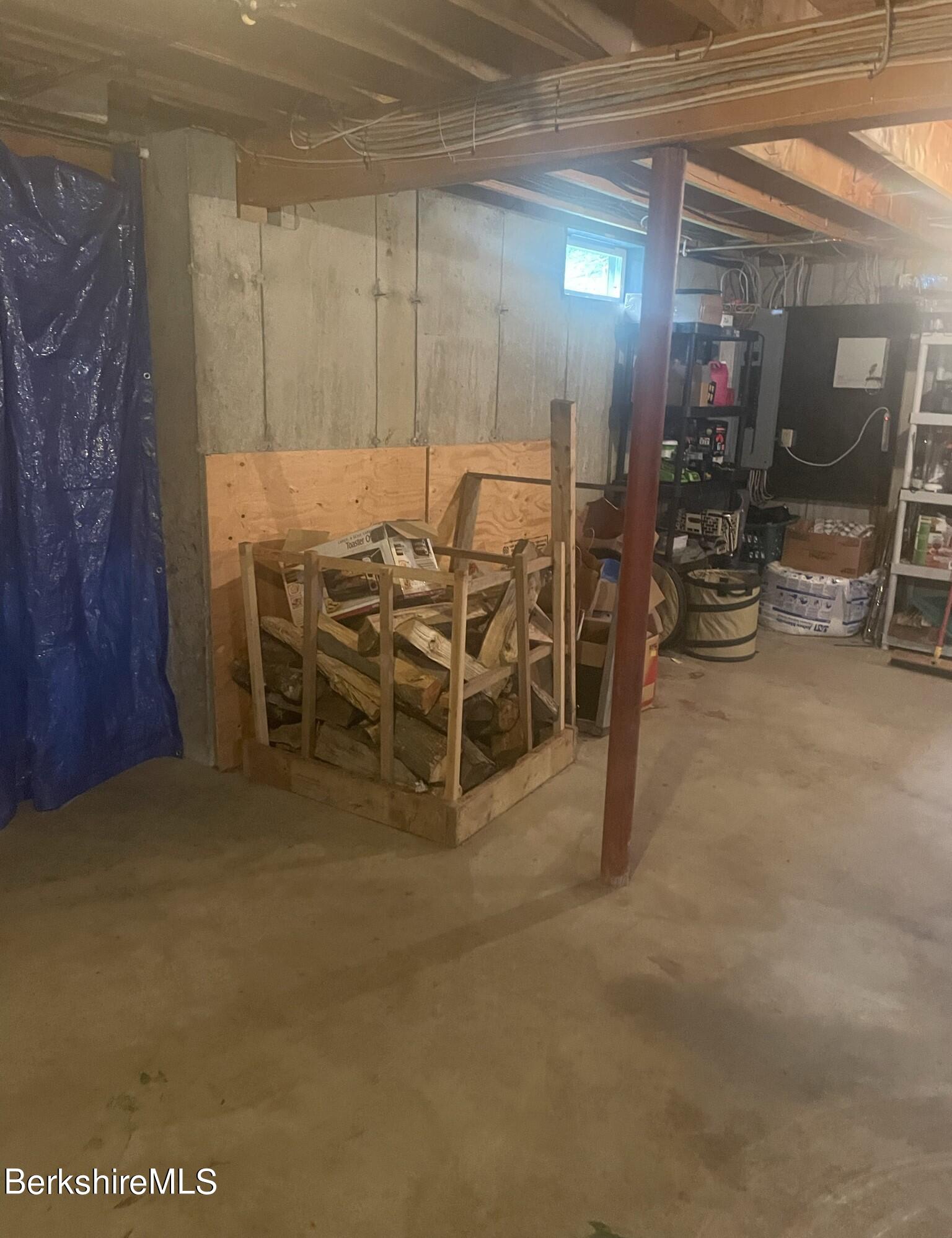 565 New State Road Savoy, MA 01256 - Photo 21 of 24 a view of a tables and chairs in a room