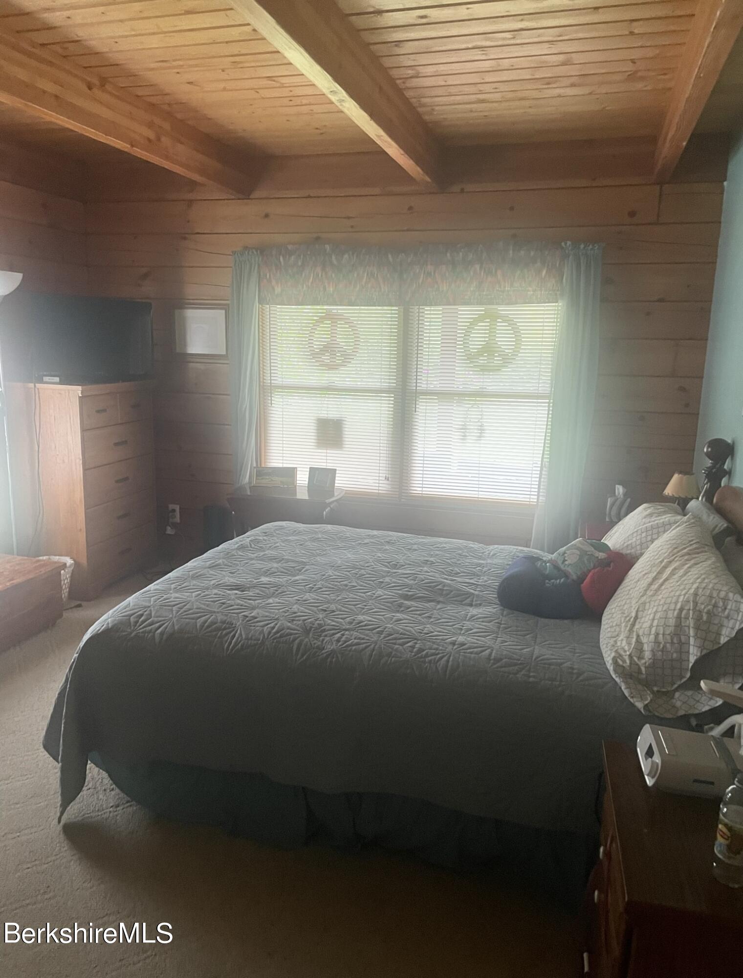 565 New State Road Savoy, MA 01256 - Photo 6 of 24 a bedroom with a bed and window