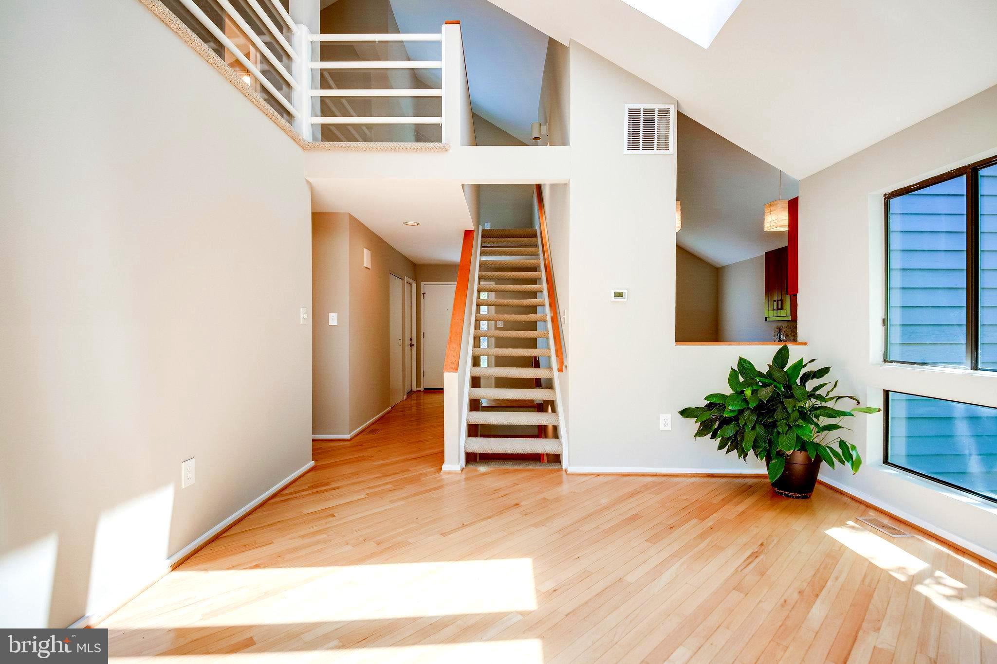 1656 Cedar Hollow Way Reston, VA 20194 - Photo 12 of 36 Open stairs to upper level.