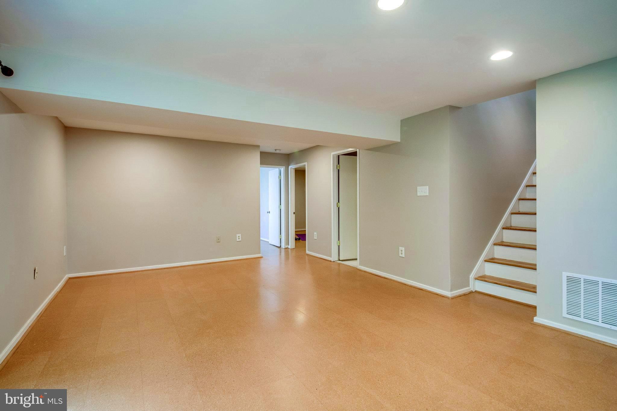 1656 Cedar Hollow Way Reston, VA 20194 - Photo 27 of 36 Large, bright, open lower level family room