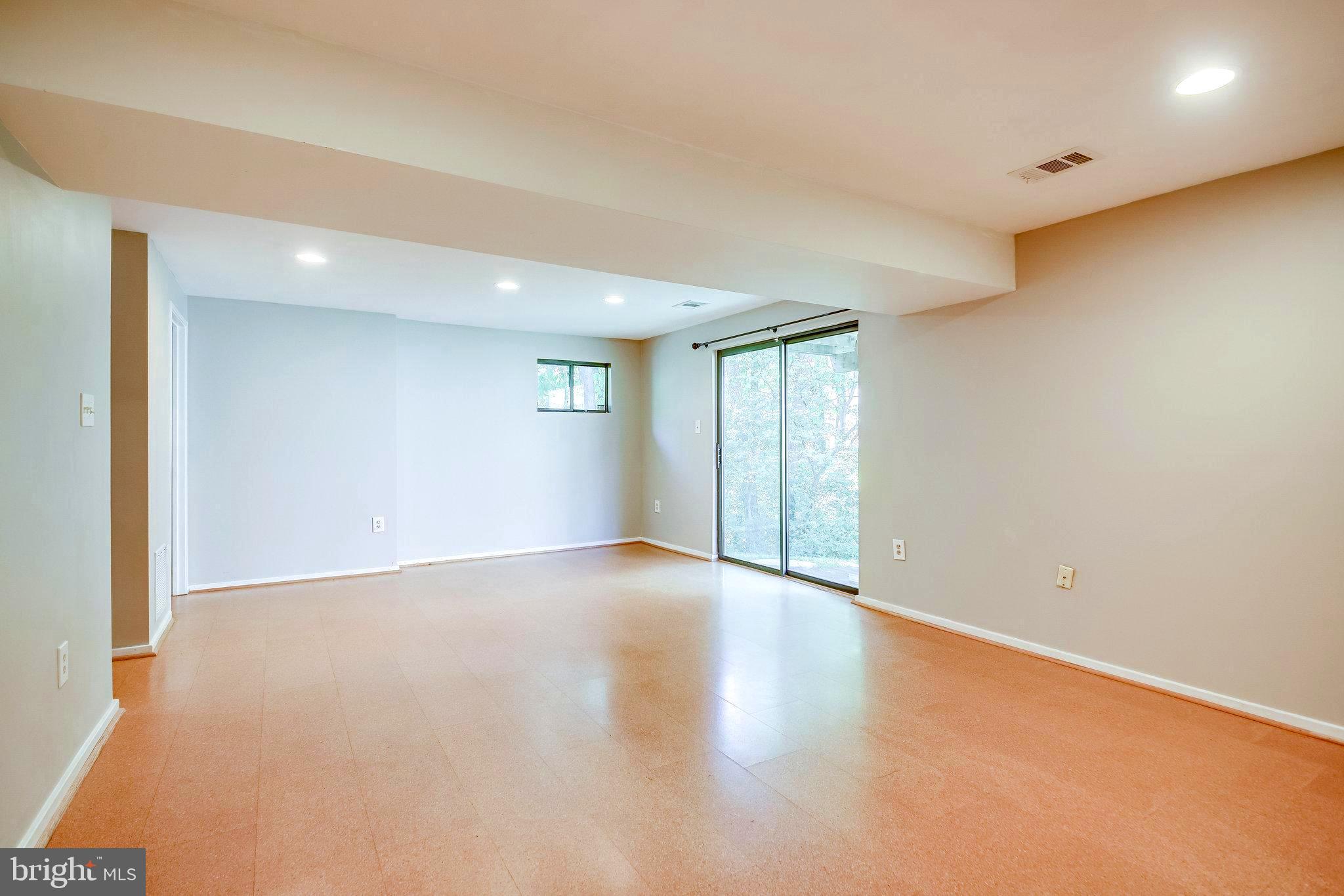 1656 Cedar Hollow Way Reston, VA 20194 - Photo 28 of 36 Full walk out to patio, cork floors