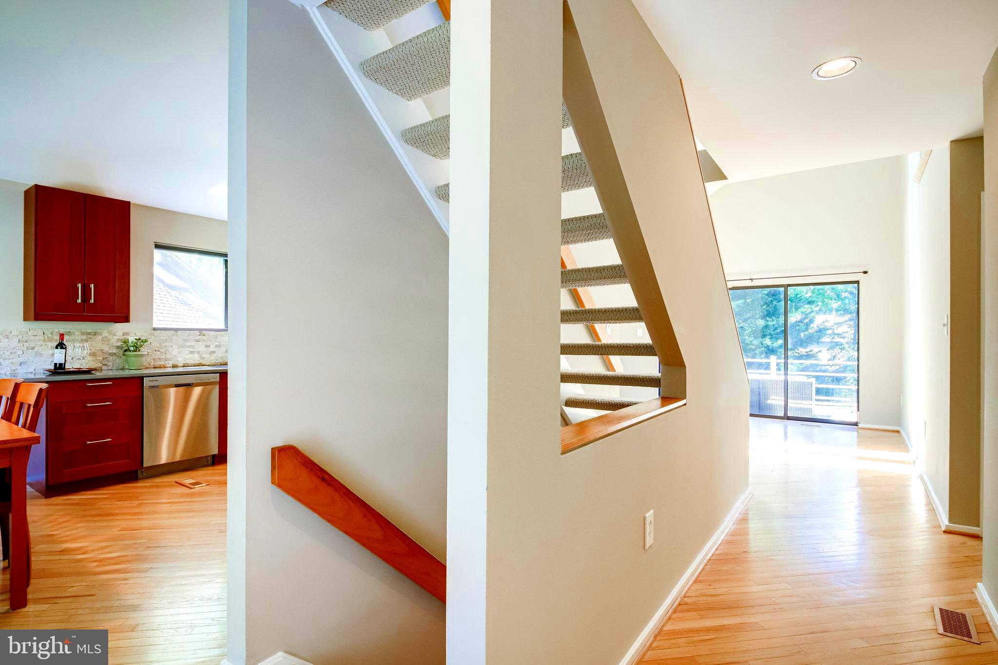 1656 Cedar Hollow Way Reston, VA 20194 - Photo 7 of 36 Wrap around the stairways to the living room