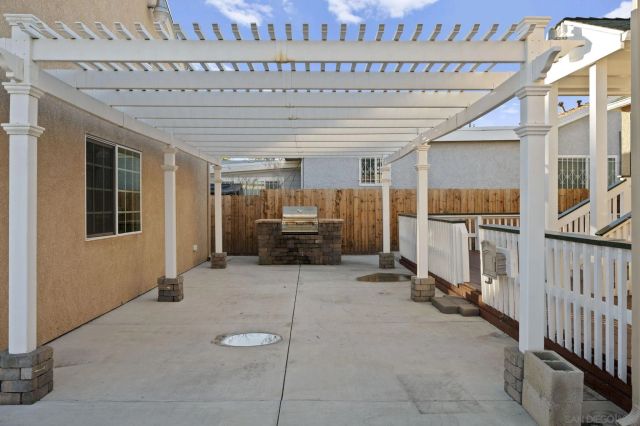 a view of a hallway with entryway chandelier and entryway