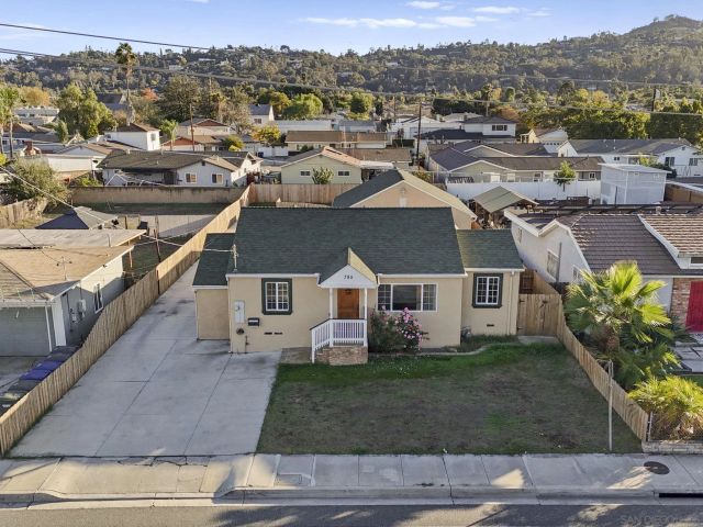 a view of a city with yard