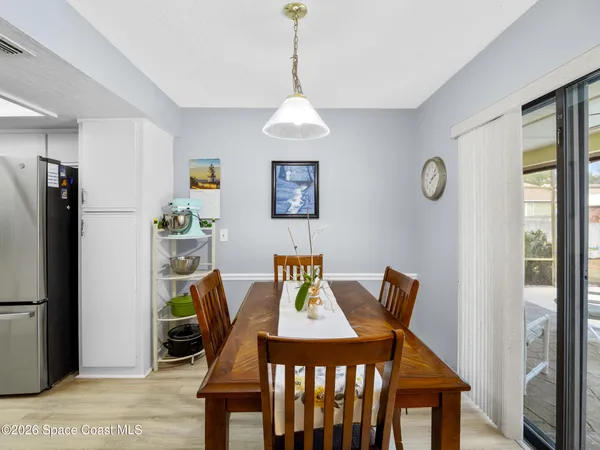 a kitchen with stainless steel appliances a refrigerator stove microwave and sink
