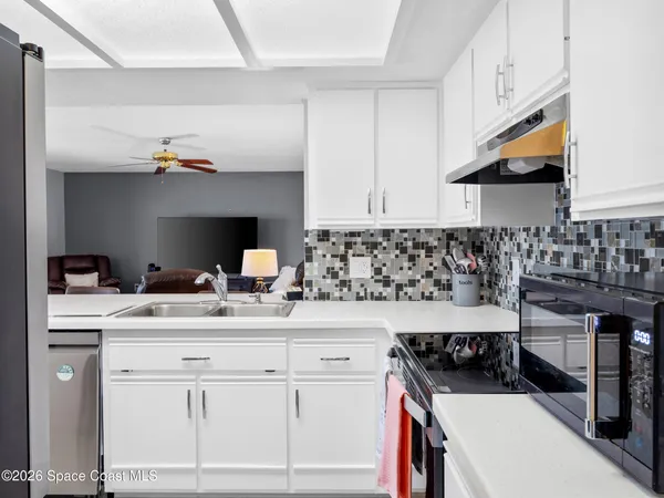 a bedroom with bed and window