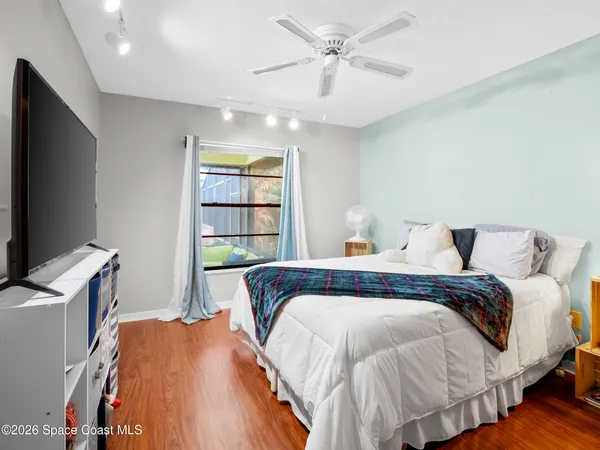 a view of a swimming pool with outdoor seating
