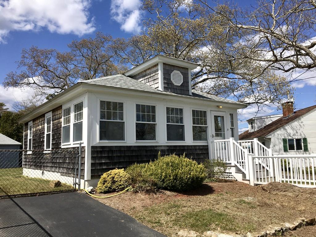 5 Barnacle Road Wareham, MA 02571 - Photo 2 of 28 a front view of a house with a yard
