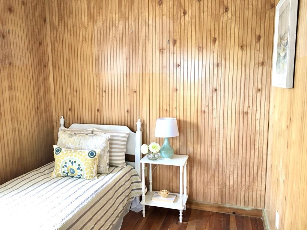 5 Barnacle Road Wareham, MA 02571 - Photo 23 of 28 a bedroom with a bed and wooden floor