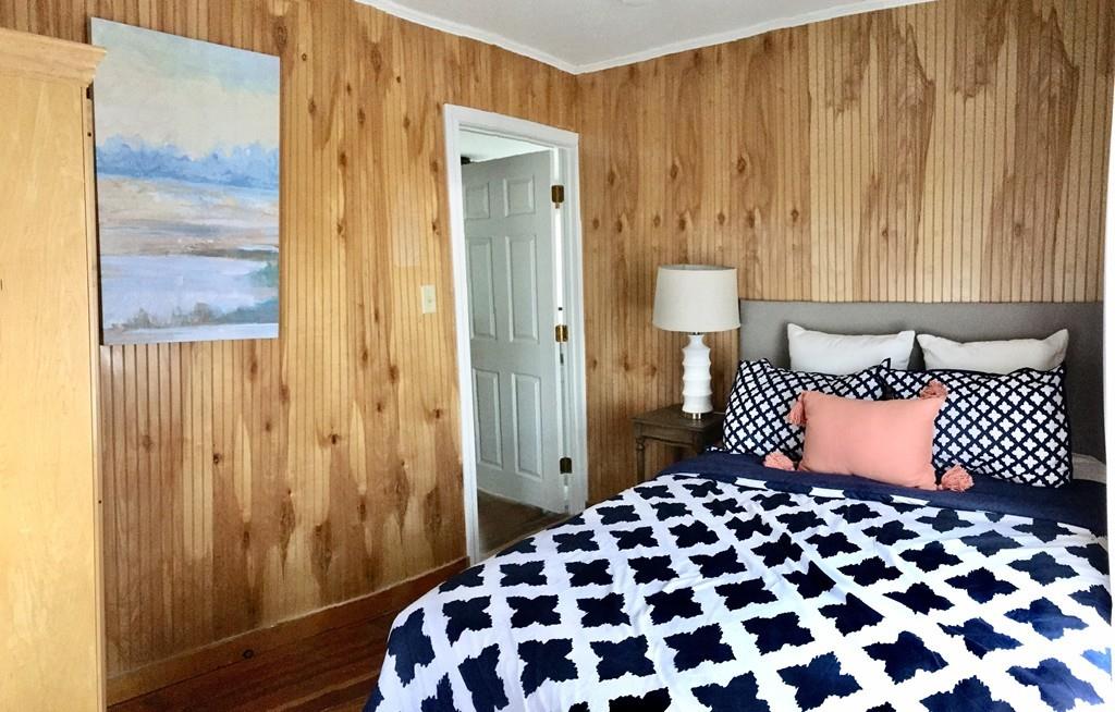 5 Barnacle Road Wareham, MA 02571 - Photo 25 of 28 a bedroom with a bed and a table