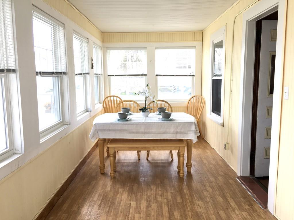 5 Barnacle Road Wareham, MA 02571 - Photo 6 of 28 a view of a living room with a window and wooden floor