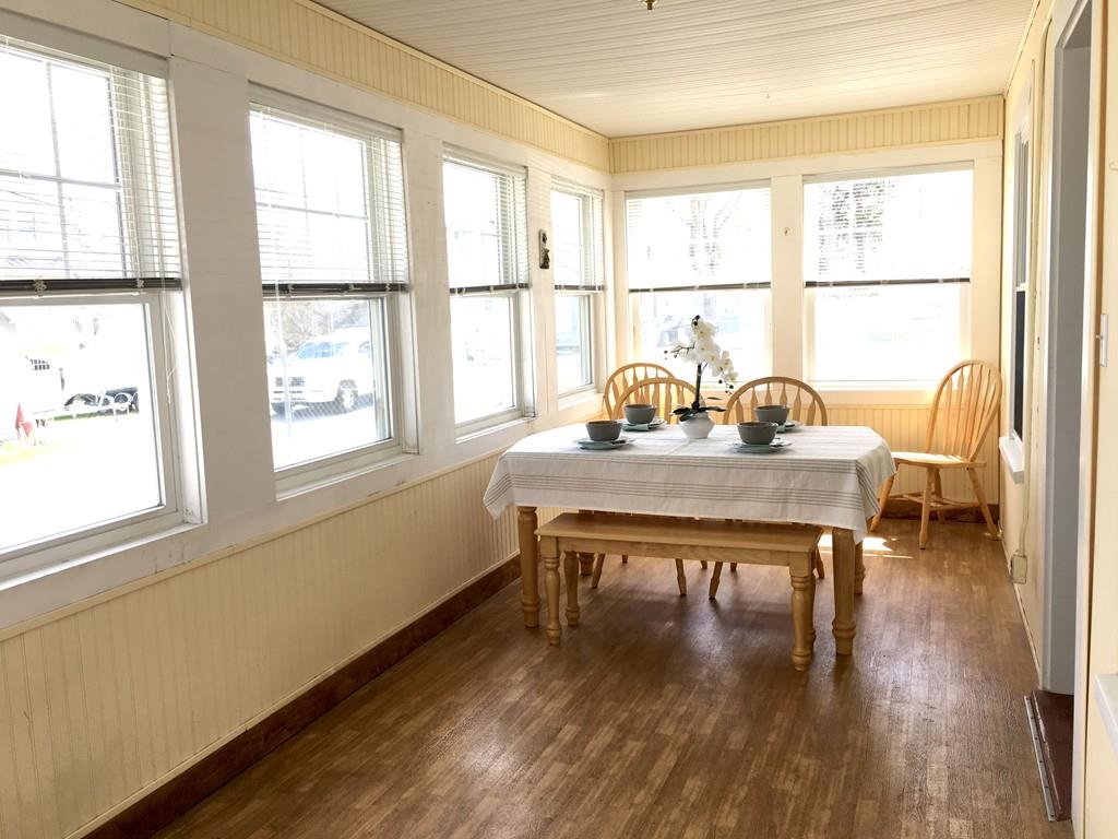 5 Barnacle Road Wareham, MA 02571 - Photo 7 of 28 a view of a workspace with wooden floor and a window