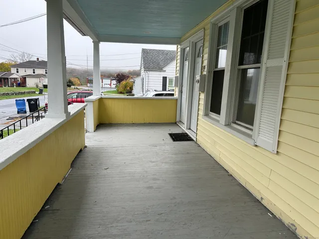a view of a kitchen with a large window