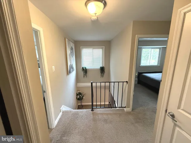a view of a livingroom with a staircase