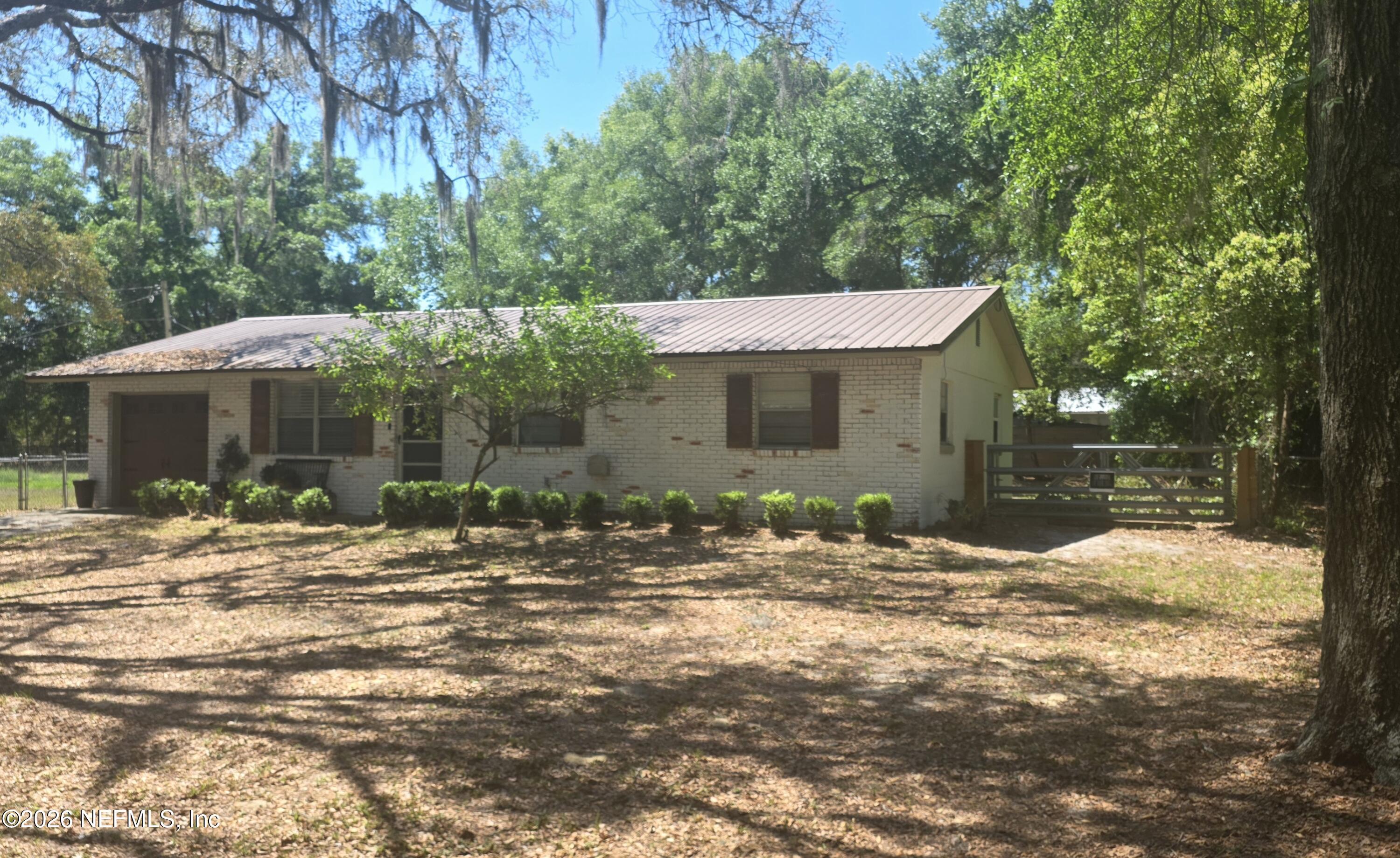 465 Nightingale Street Keystone Heights, FL 32656 - Photo 2 of 23 FRONT FROM ANGLE