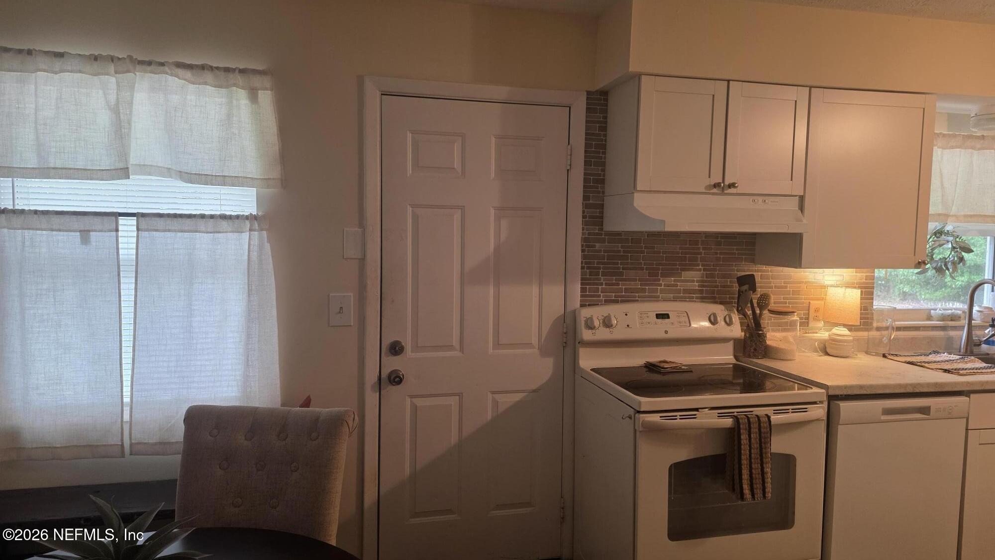 465 Nightingale Street Keystone Heights, FL 32656 - Photo 6 of 23 KITCHEN TO BACK DOOR