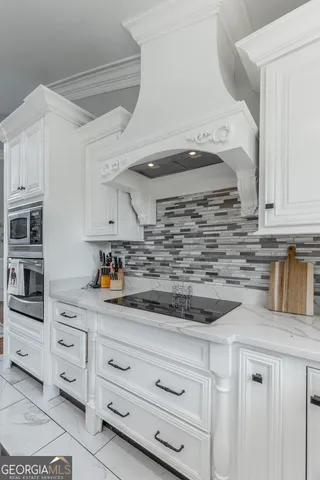 a view of backyard of house with green space