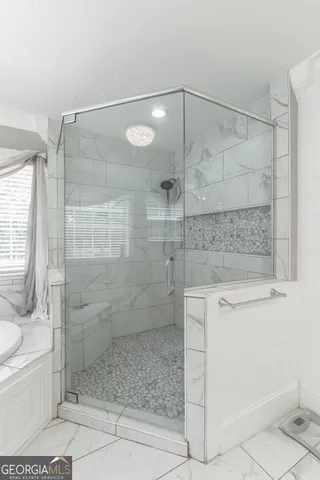 a view of a house with a large window