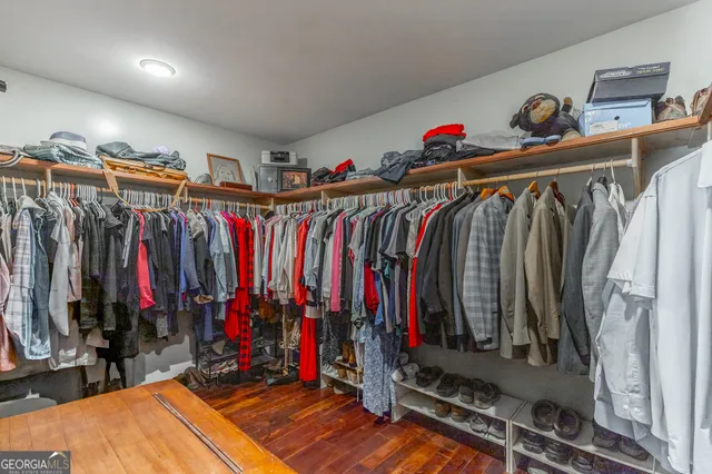 a view of a park with large trees