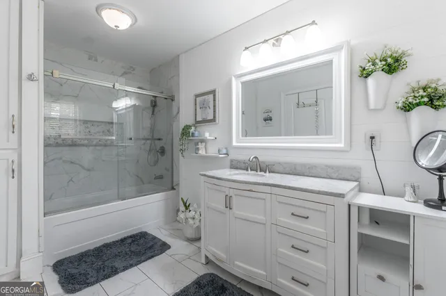 a view of balcony with floor to ceiling windows