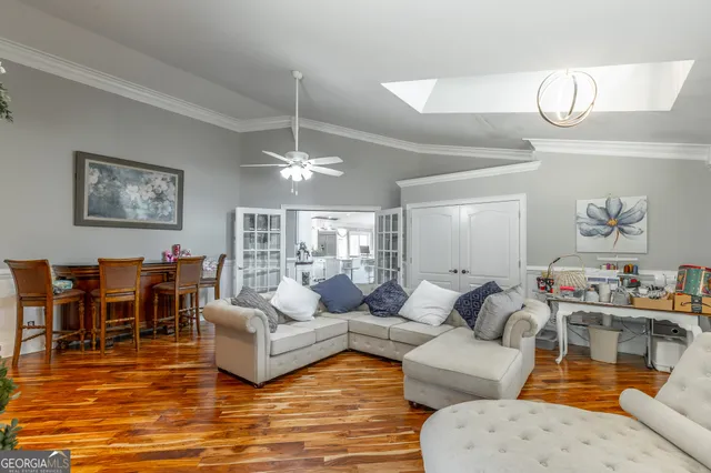 a view of a lush green outdoor space with a lake view and a lake view