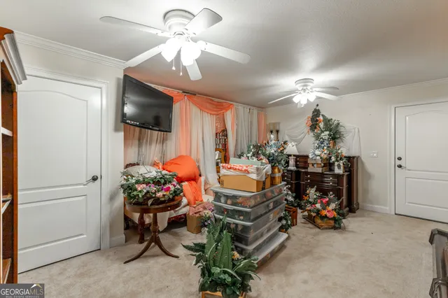 a green field with lots of trees in it