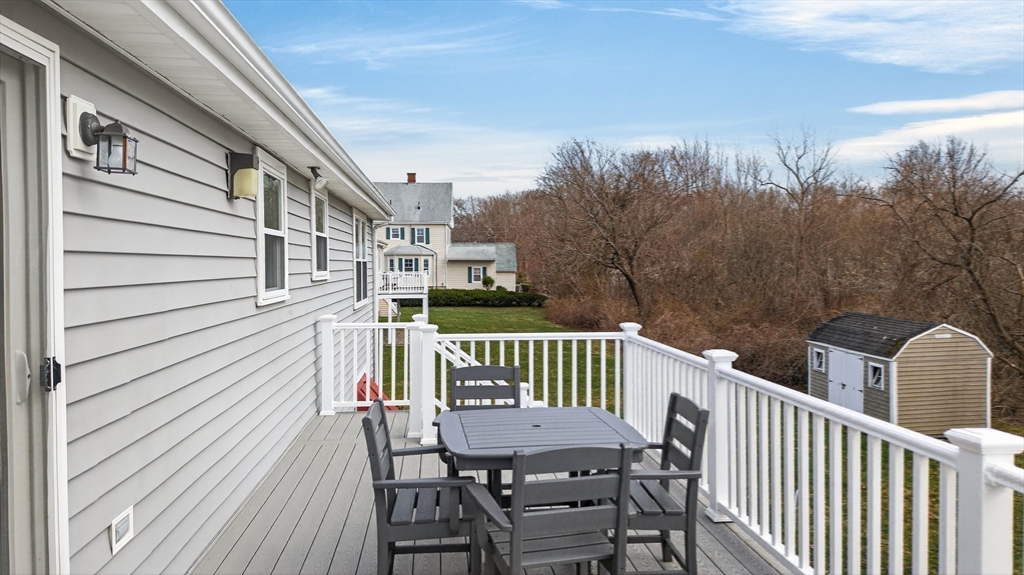 1079 Langley Street Fall River, MA 02720 - Photo 30 of 40 a view of a chair in the balcony