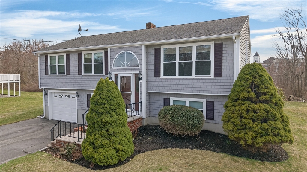 1079 Langley Street Fall River, MA 02720 - Photo 4 of 40 a front view of a house