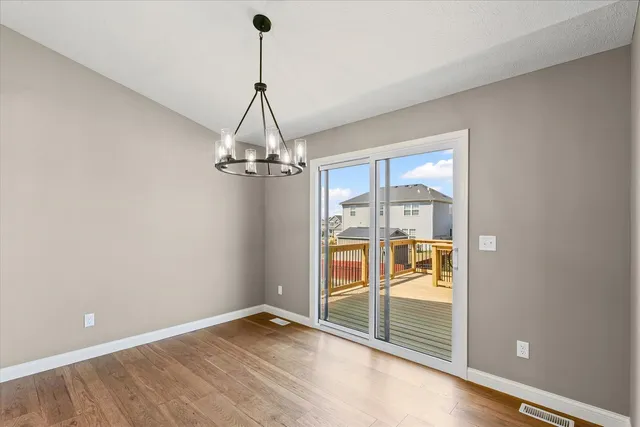 a view of a room with a chandelier