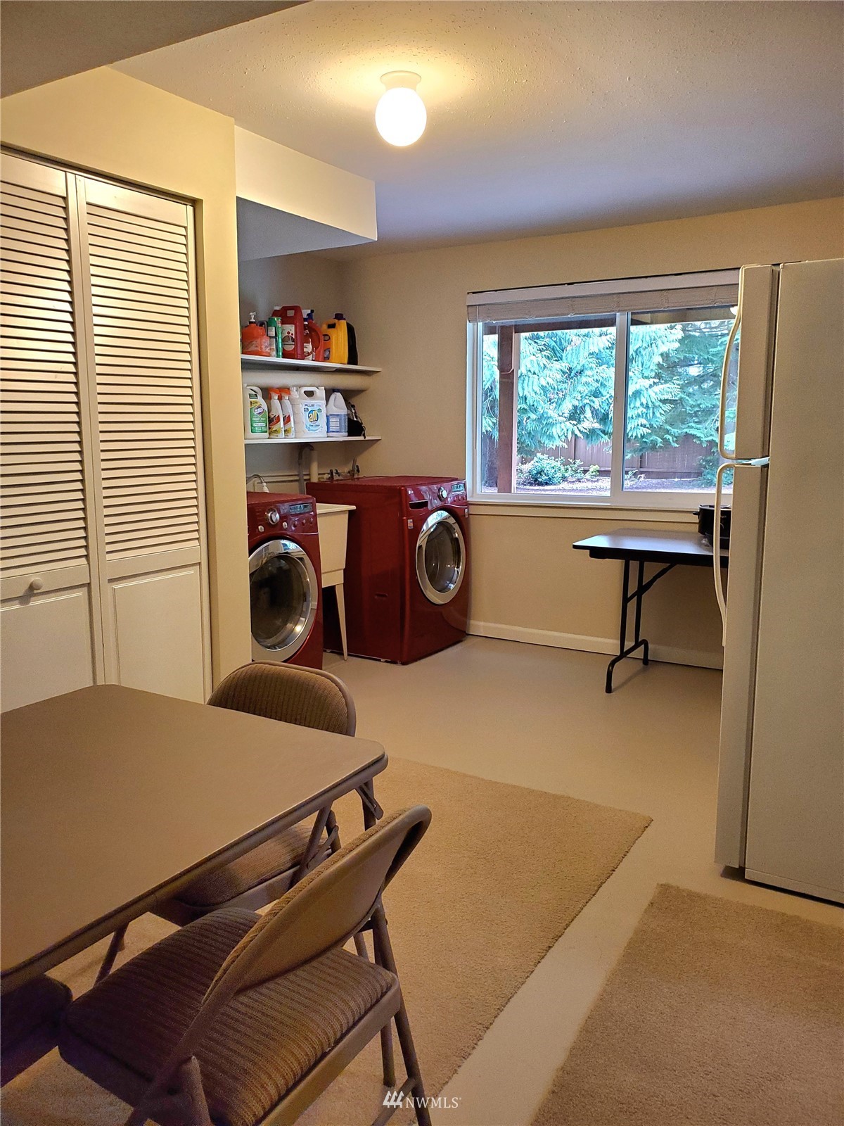 15927 35th Avenue Southeast Bothell, WA 98012 - Photo 26 of 35 a room with furniture and a window