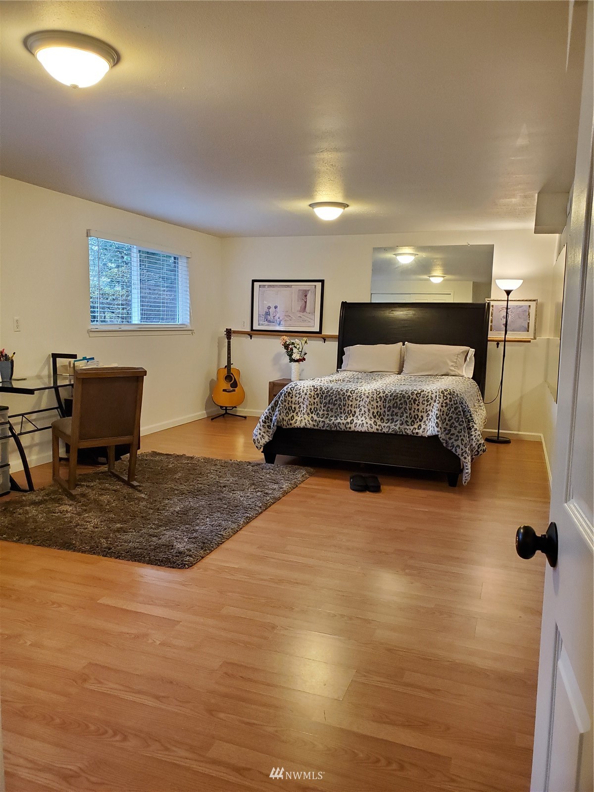 15927 35th Avenue Southeast Bothell, WA 98012 - Photo 31 of 35 a bedroom with a bed and window