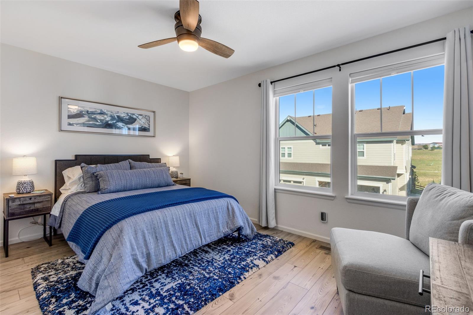 306 Rodden Drive Erie, CO 80516 - Photo 21 of 49 a bedroom with a large bed and a window