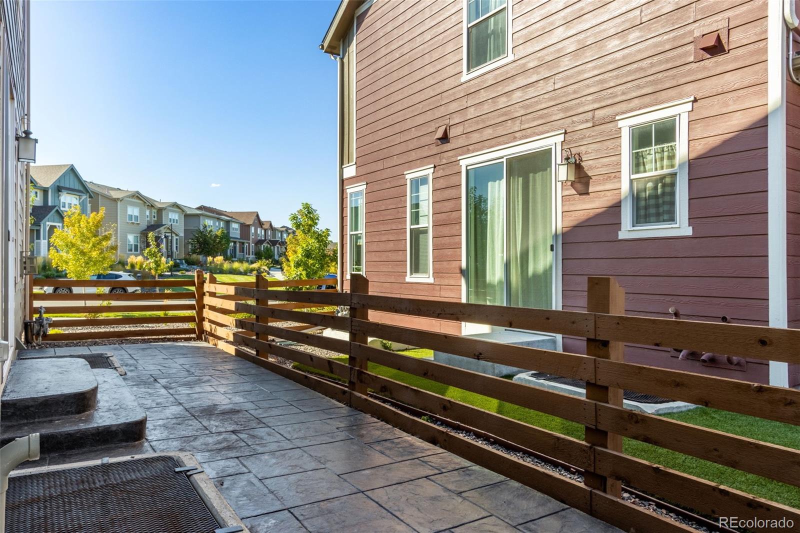306 Rodden Drive Erie, CO 80516 - Photo 29 of 49 a view of a bench in front of building