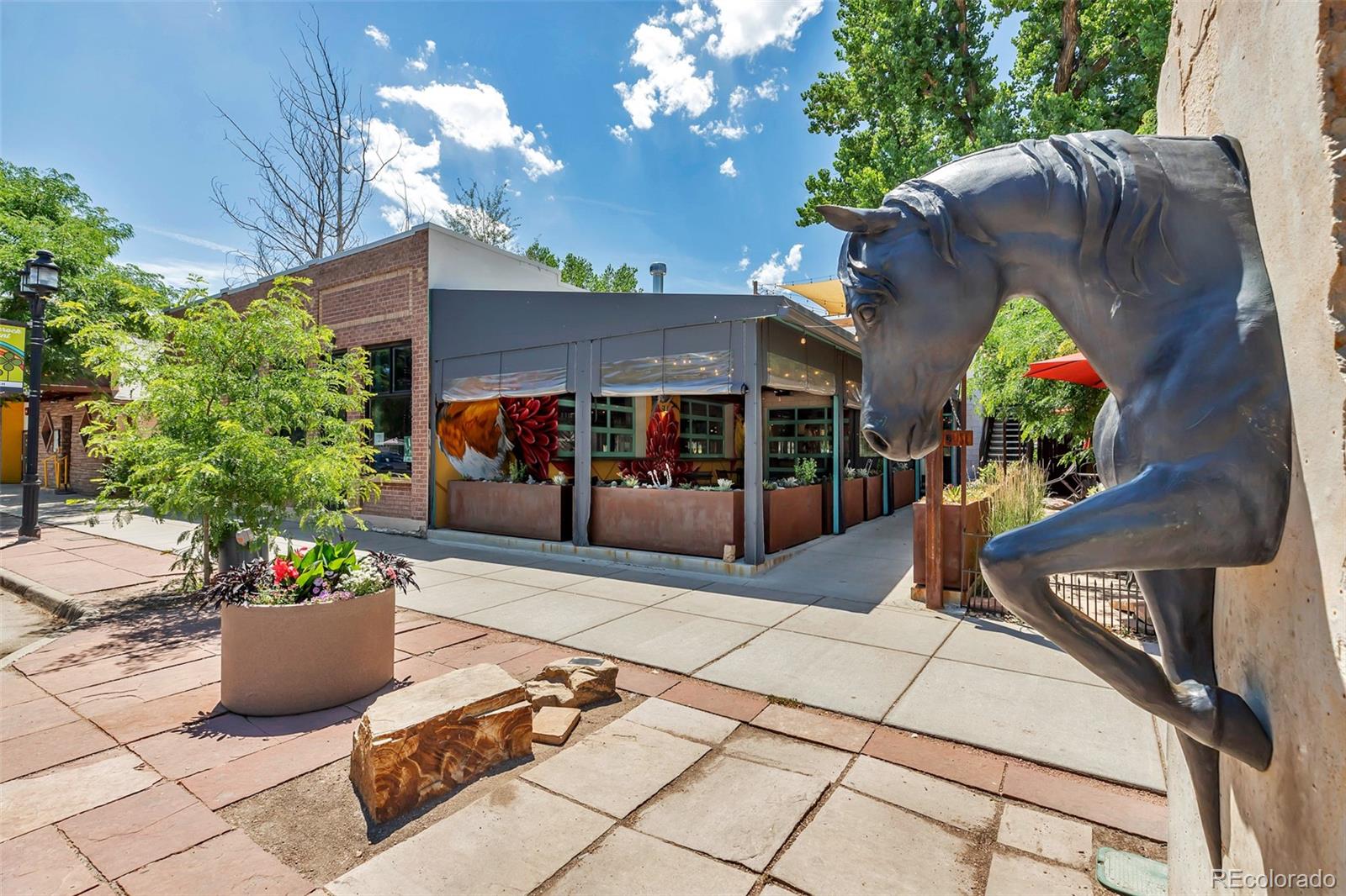 306 Rodden Drive Erie, CO 80516 - Photo 49 of 49 a view of a chairs and table in the patio