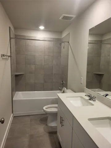 an empty room with a empty space and windows