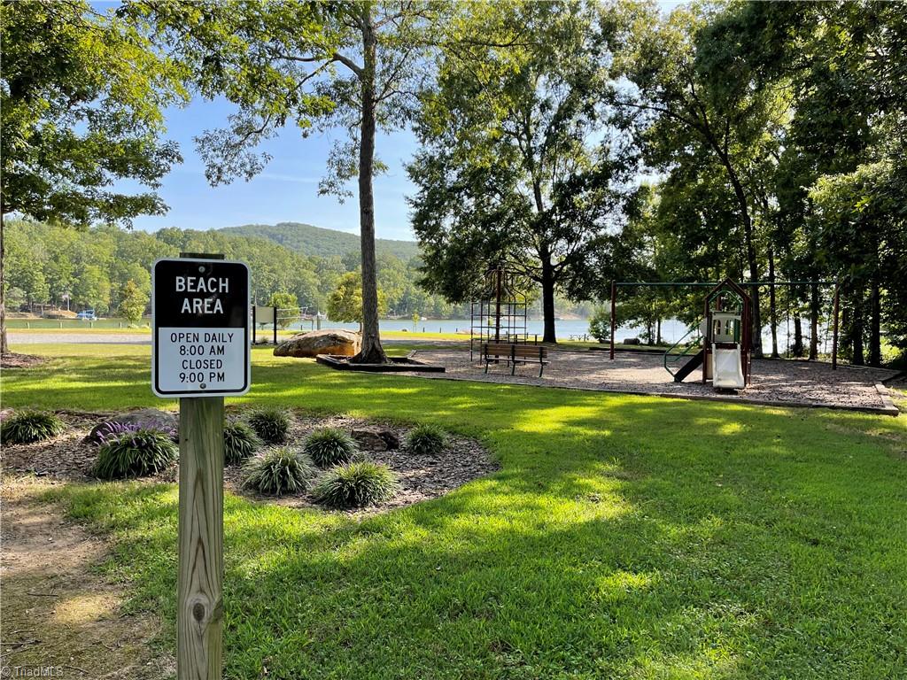 180 Roehm Landing Denton, NC 27239 - Photo 17 of 35 This beach and playground area is beside this house. If you have kids or grandkids then you have built-in entertainment for them.
