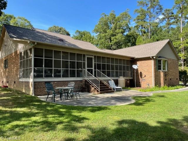 Rear of the home that faces the lake. 