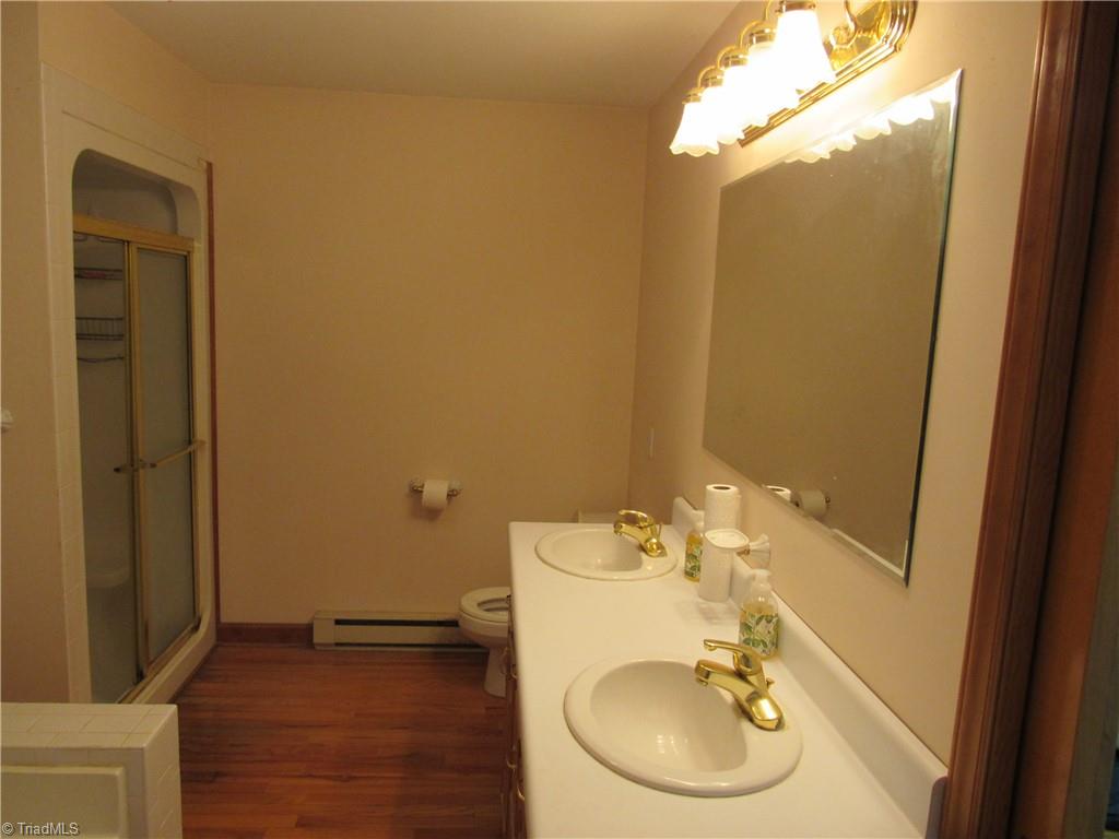 180 Roehm Landing Denton, NC 27239 - Photo 29 of 35 The master closet is cavernous. It is as big as most bedrooms.
