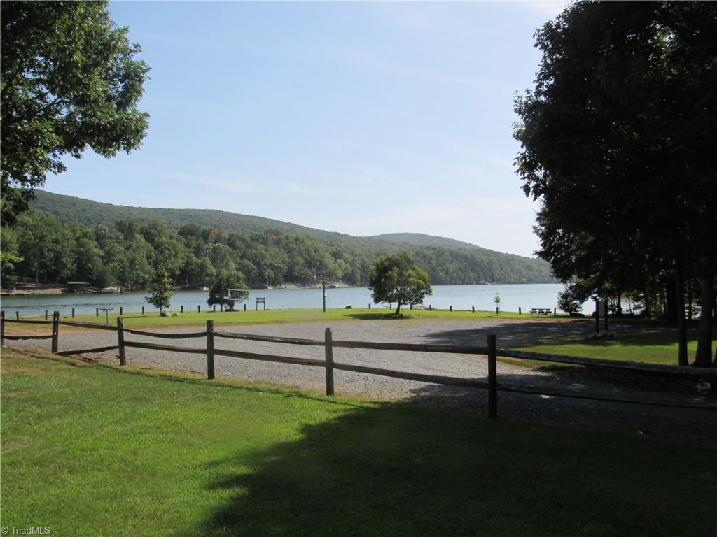 2 Car Garage and the driveway goes all the way to the lake.  Just back your boat in to the water and begin the adventure.
